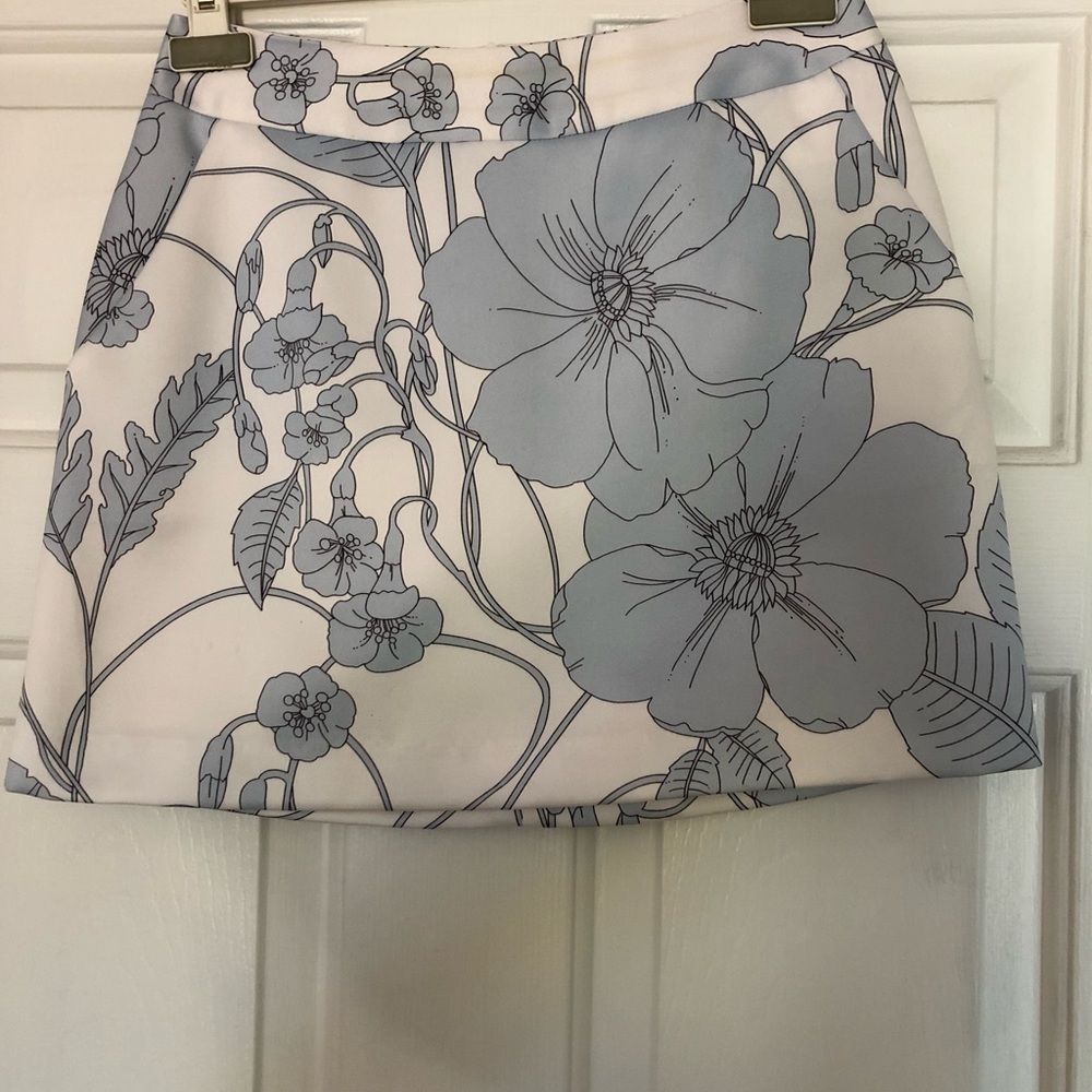 BCBG baby blue and whit flowery mini skirt